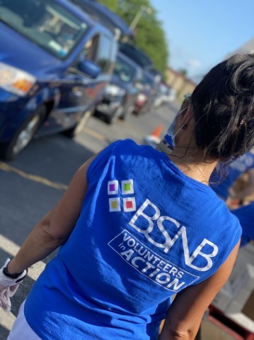 Back of a BSNB employee volunteer t-shirt